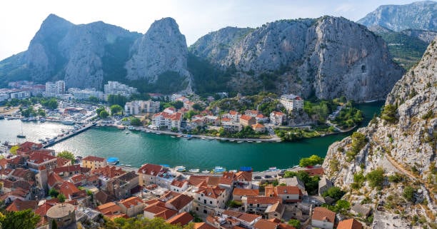 Omiš rooftops and the river below rugged mountains